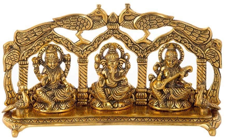 Lakshmi Ganesh Saraswathy statue with peacock