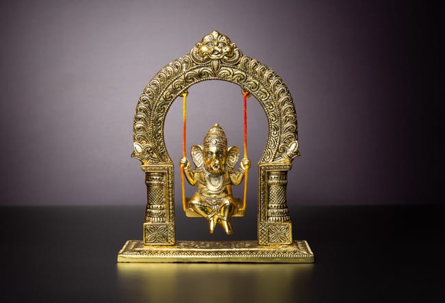Baby Ganesha on jhula statue
