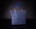 Brocade bag with tri-leaf print