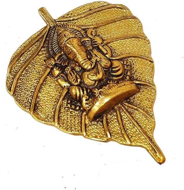White metal leaf ganesha face gold finish
