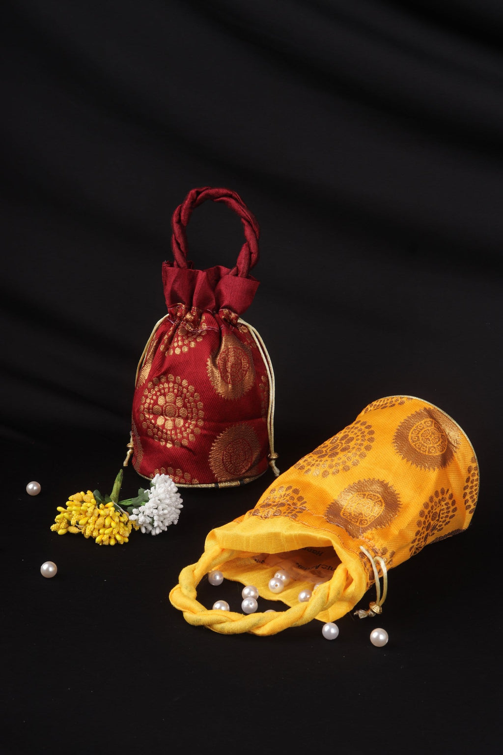 Round motif Kantha potli