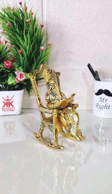 White Metal Golden Lord Ganesha Statue Sitting On A Chair