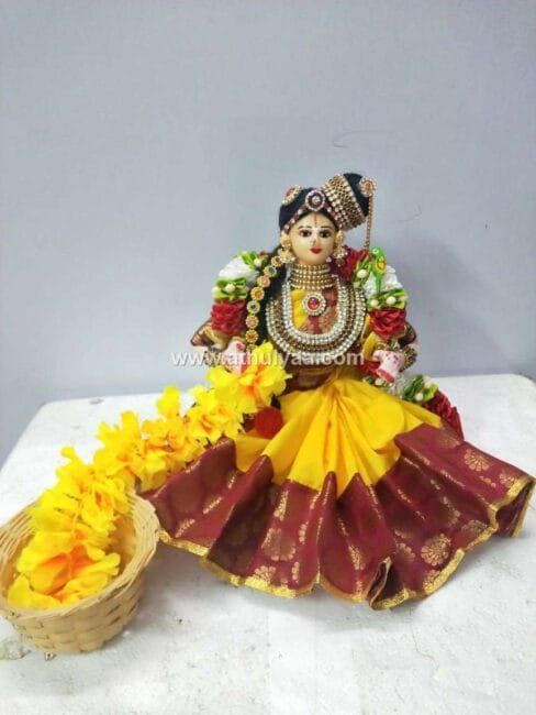 Sitting Aandal Doll Making Garland